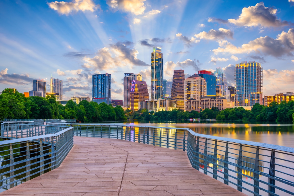 Austin, Texas, USA downtown skyline over the Colorado River.