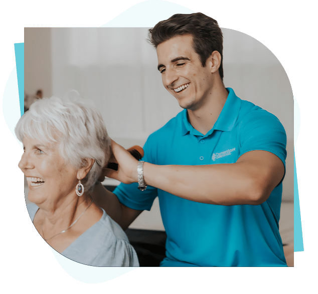 Caregiver brushing seniors hair