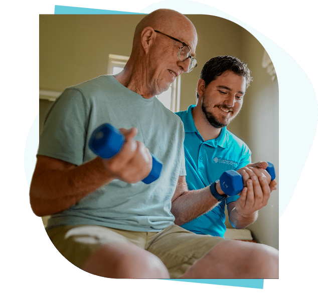 Caregiver assisting senior with his exercise